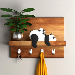 PUTSKA panda wall display adds character to forest-inspired baby room.