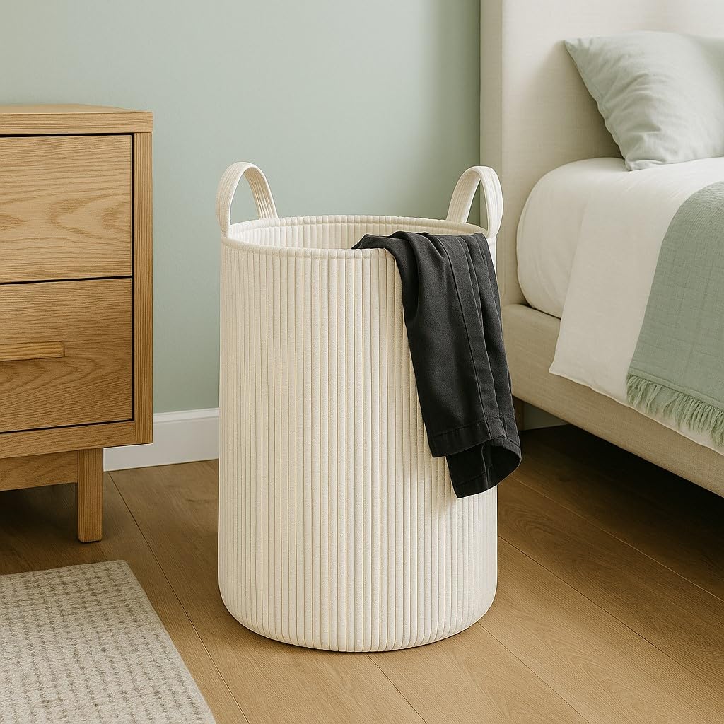PUTSKA laundry basket XXL cream blankets loaded for quick living room storage
