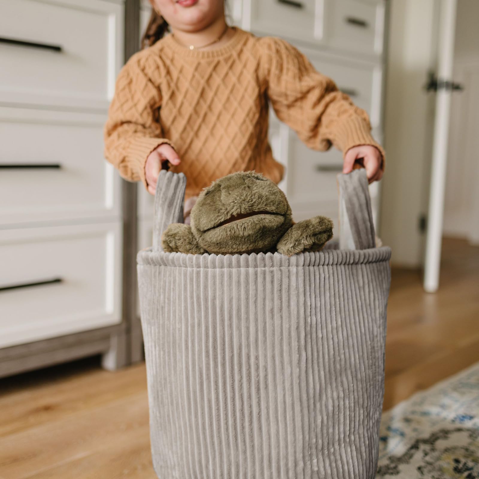 PUTSKA nursery storage blanket basket showing versatile use in kid-friendly spaces.