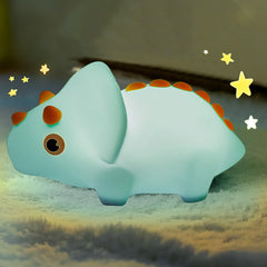 PVOGRT Dinosaurs Night Light in blue with soft-touch finish for kid-friendly bedtime ambiance.