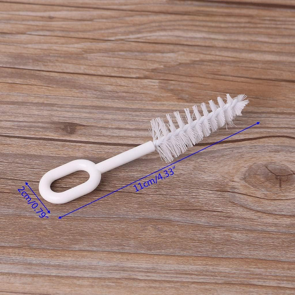 Pxiryanlow bottle, nipple, and pacifier cleaning brush in use