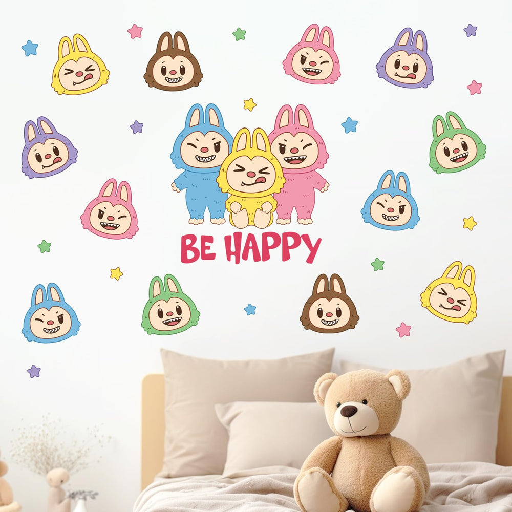 Pycat Be Happy Macaron Monster decals brighten a kid's bedroom with playful decor.
