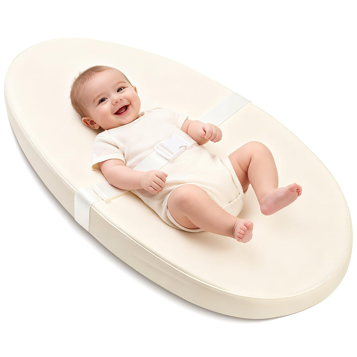 Qalvyn changing pad on dresser with waterproof cover for easy cleanup.