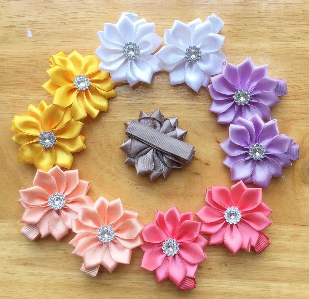 QandSweet flower clip attached to a headband for a coordinated look.