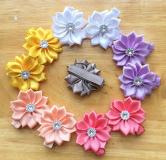 QandSweet flower clip attached to a headband for a coordinated look.