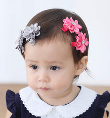QandSweet single-prong alligator clip securing hair.