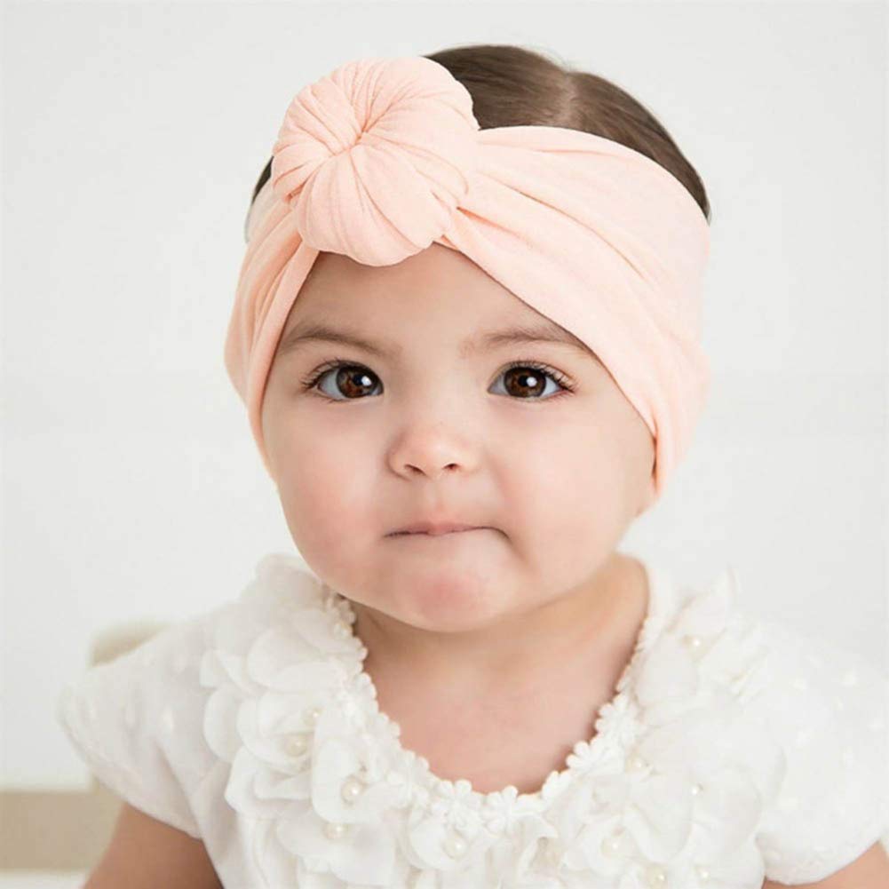 QandSweet soft silk nylon material provides stretch and a mark-free fit for tiny heads.