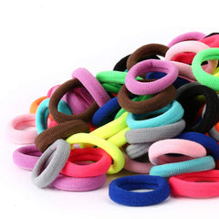 Qarwayoc baby hair ties assortment close-up, gentle seamless design protects delicate toddler hair.
