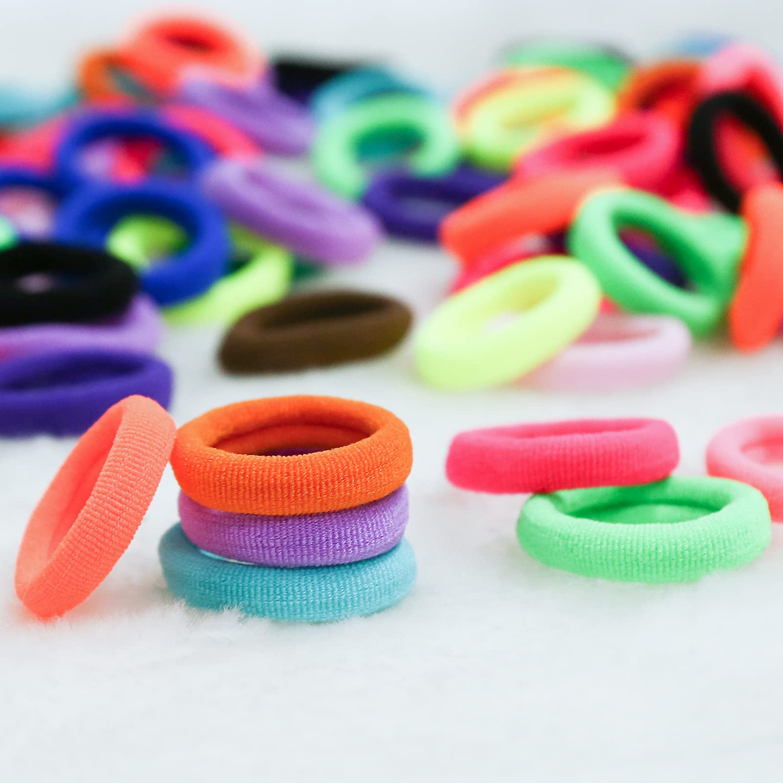 Qarwayoc hair ties used for dolls and dress-up play