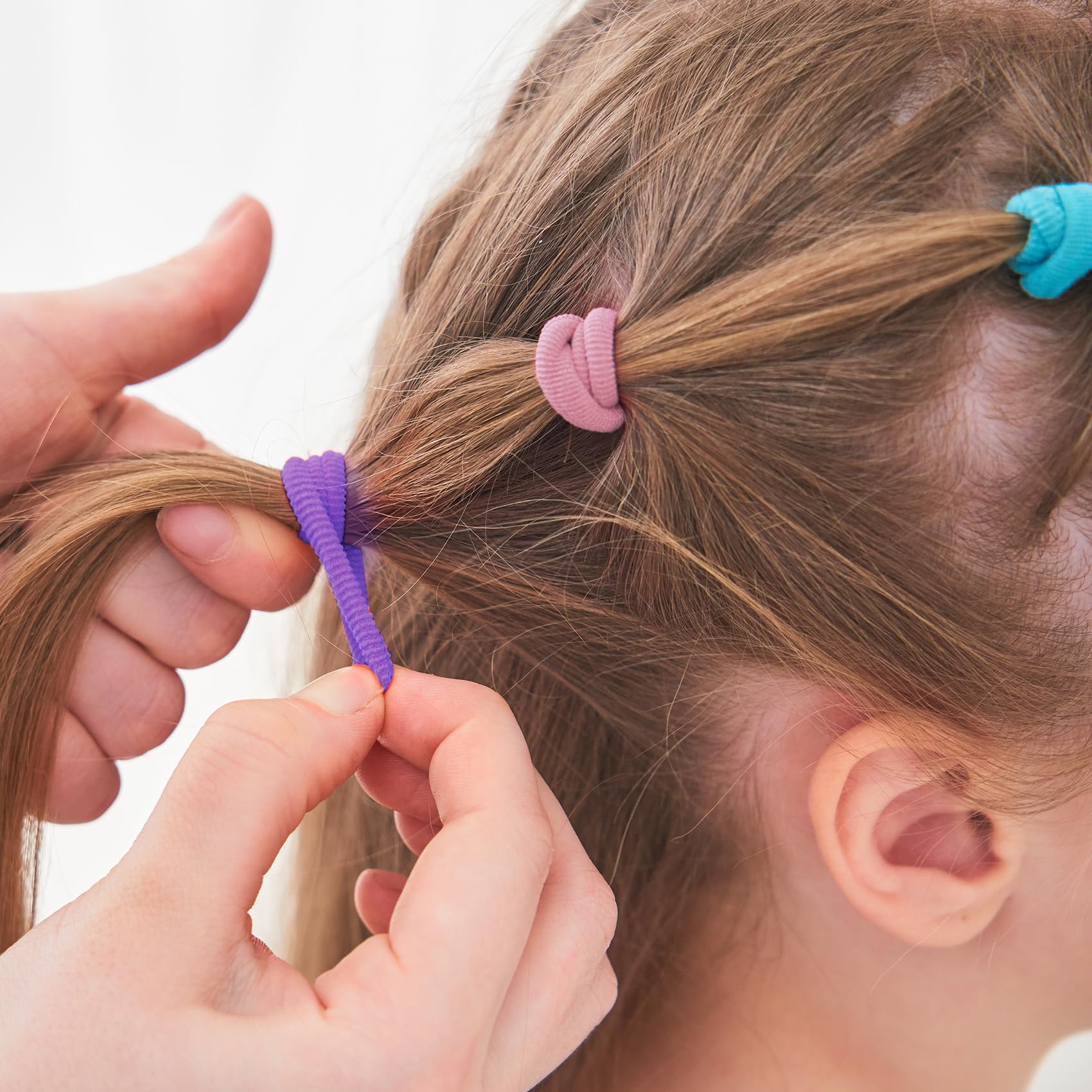 Qarwayoc mini-hair-tie suitable for dolls to create realistic hairstyles.