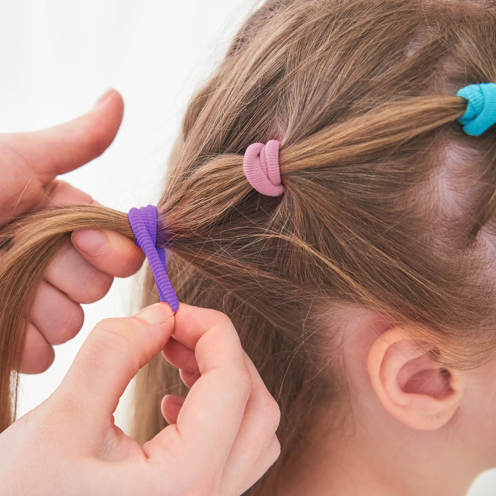 Qarwayoc mini-hair-tie suitable for dolls to create realistic hairstyles.