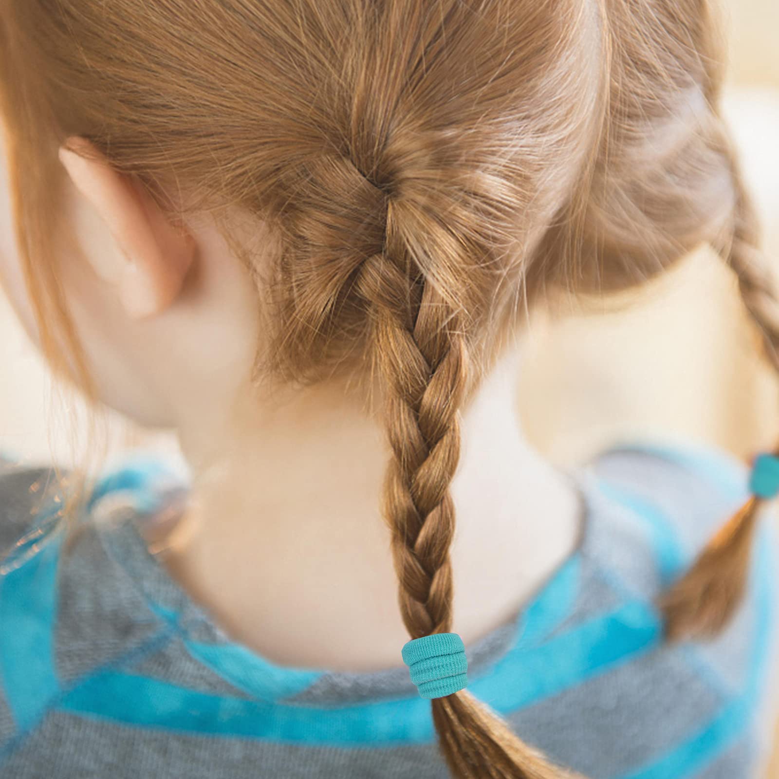 Qarwayoc kids hair ties worn by another child for styling