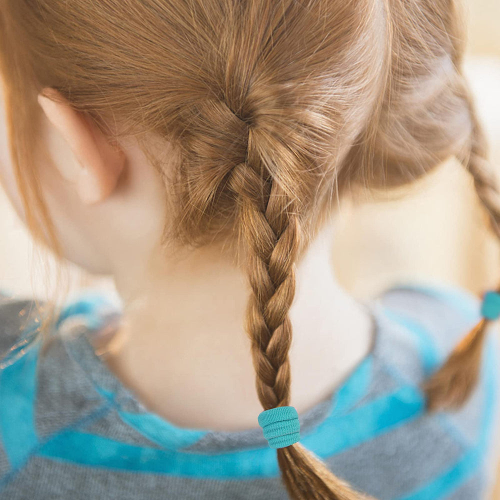 Qarwayoc kids hair ties worn by another child for styling