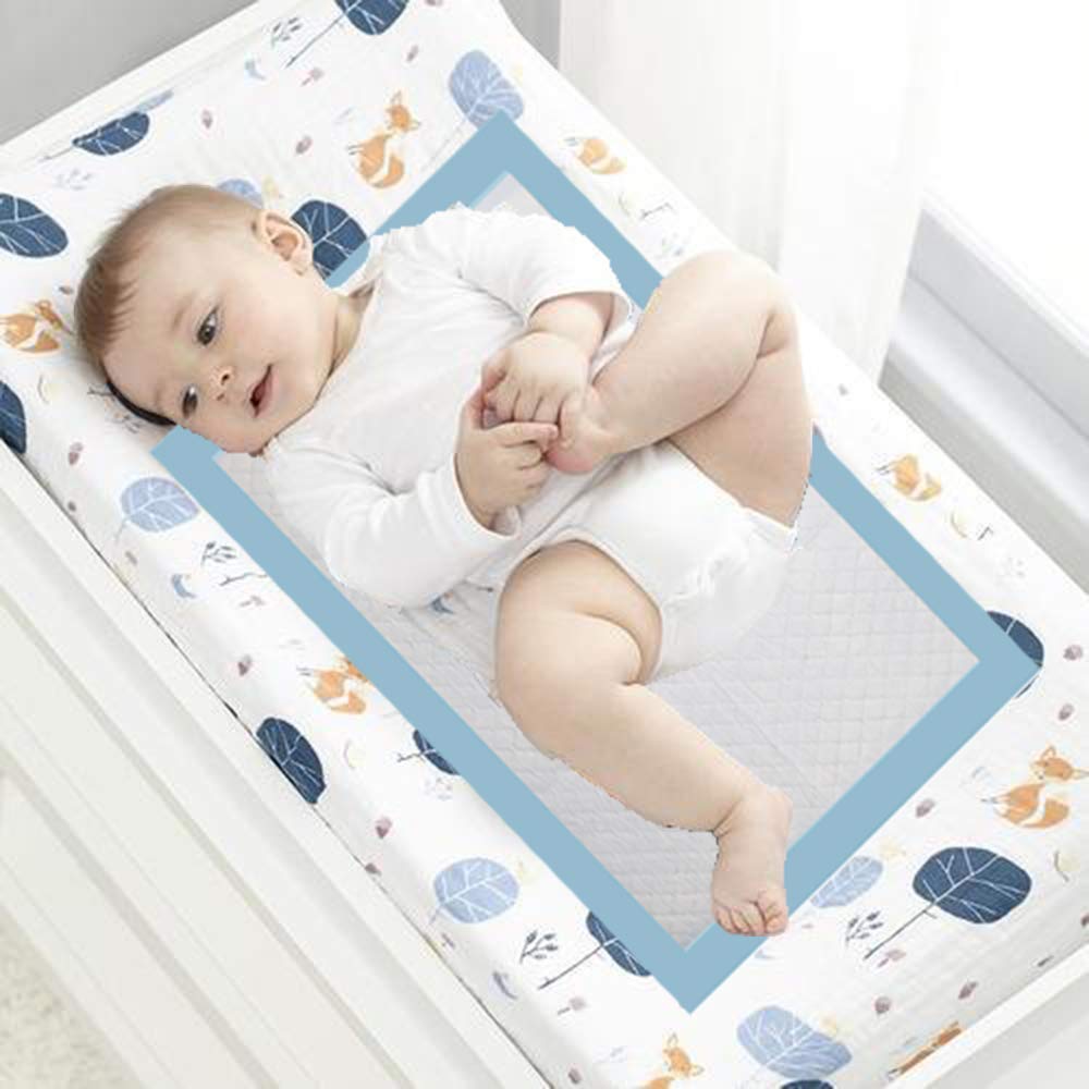 QDTTSRY baby disposable changing pad waterproof barrier image highlights leak-proof protection on surfaces
