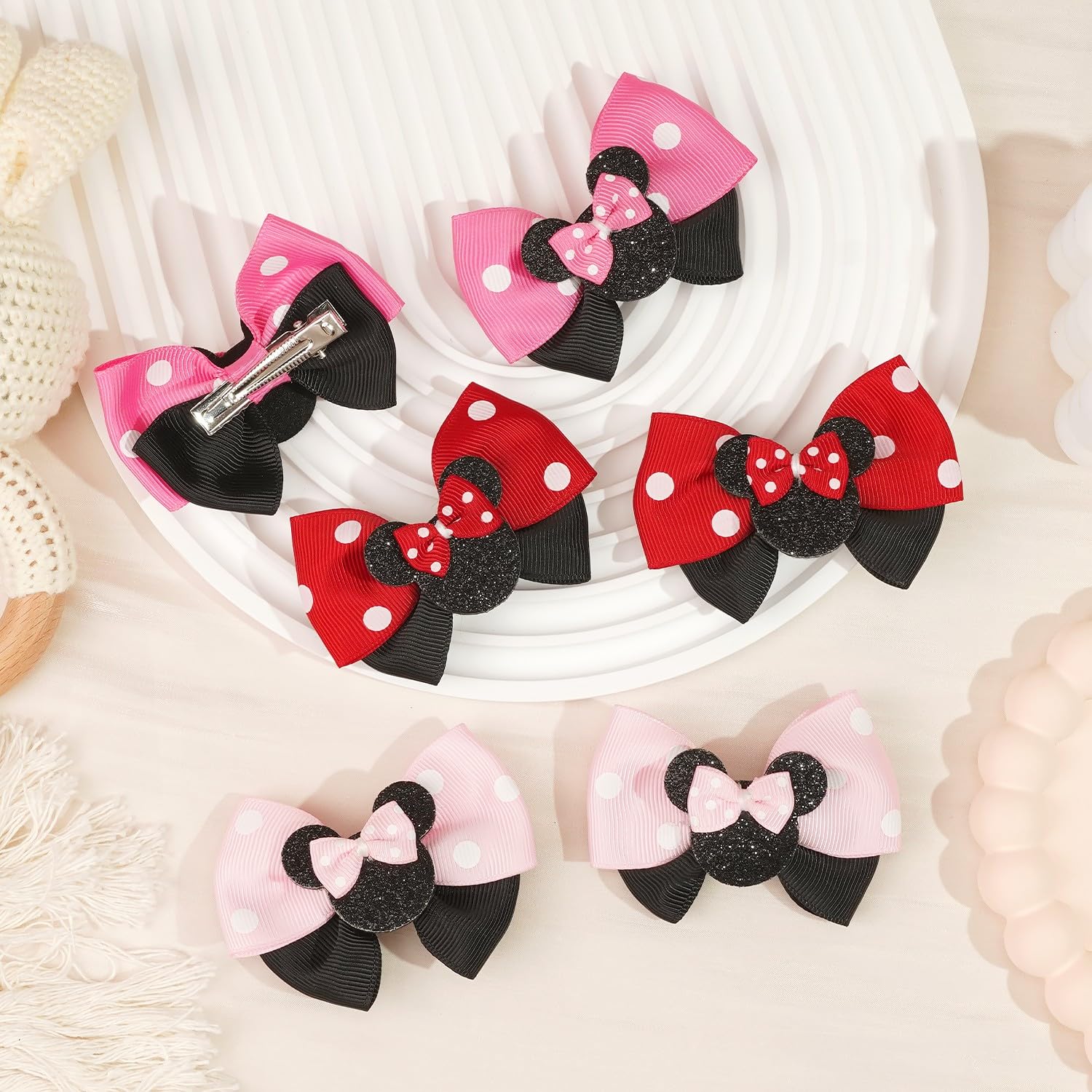 Qearl mouse ears hair clip red closeup highlighting soft fabric and clip grip