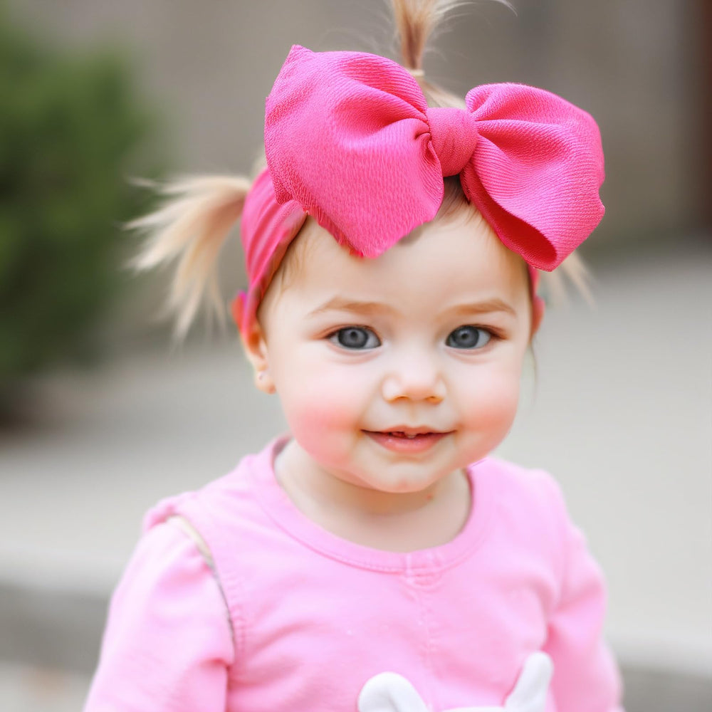 QFV Portrait-ready bows help moms capture memorable milestones.