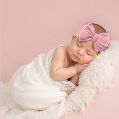 QFV stretchy headband on baby demonstrates flexible fit