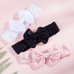 Qiansail lace bow headband styled with outfit for photos