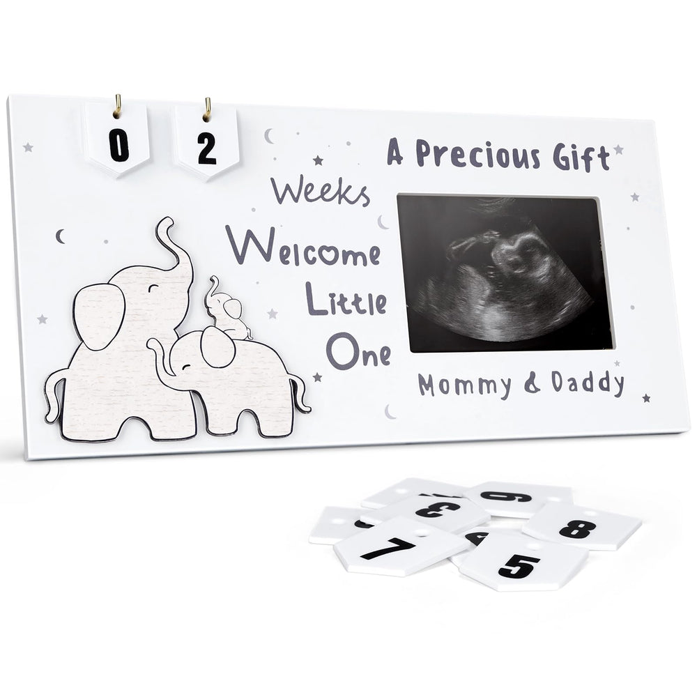 Qilxziy sonogram frame displays ultrasound photo for nursery memories.
