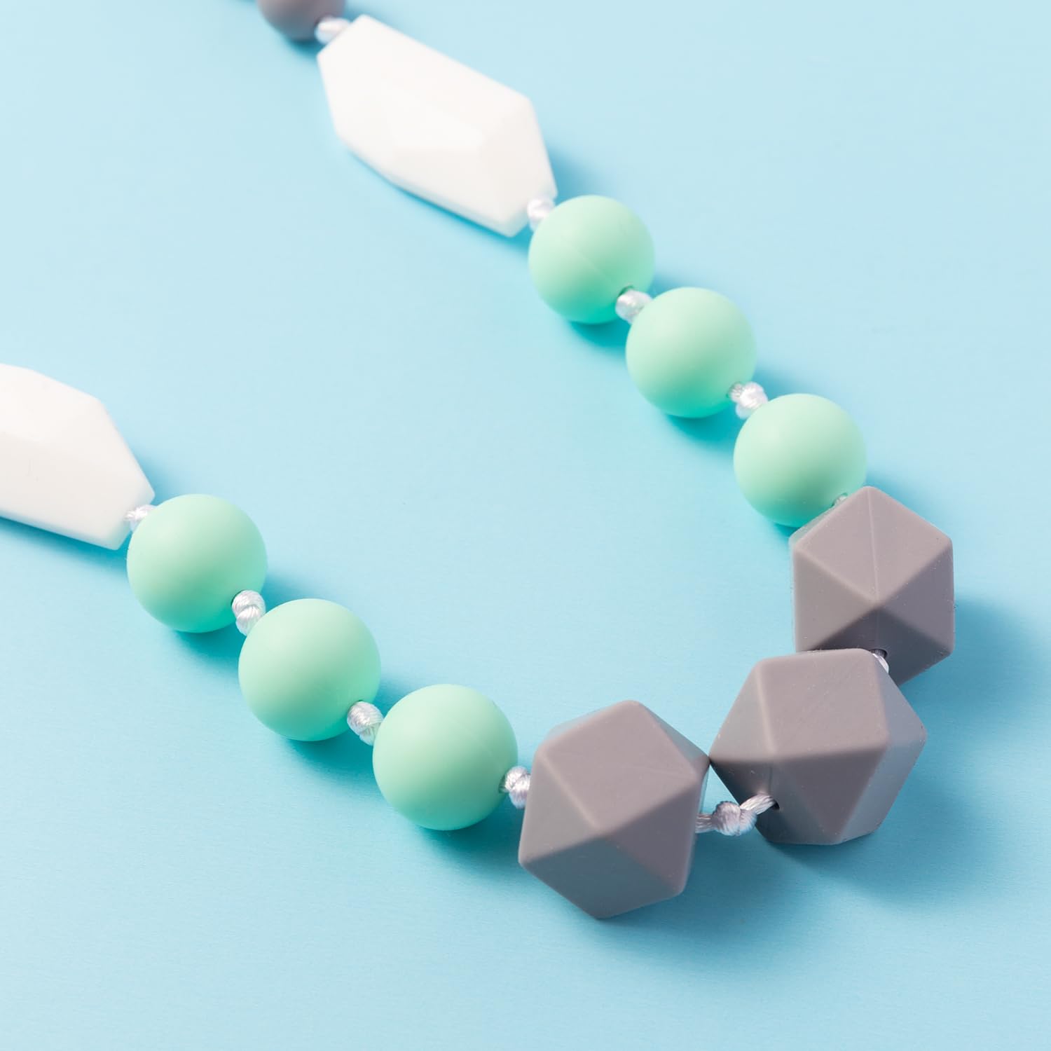 QIMGIC teething necklace style variation 01 highlights textured beads for curiosity