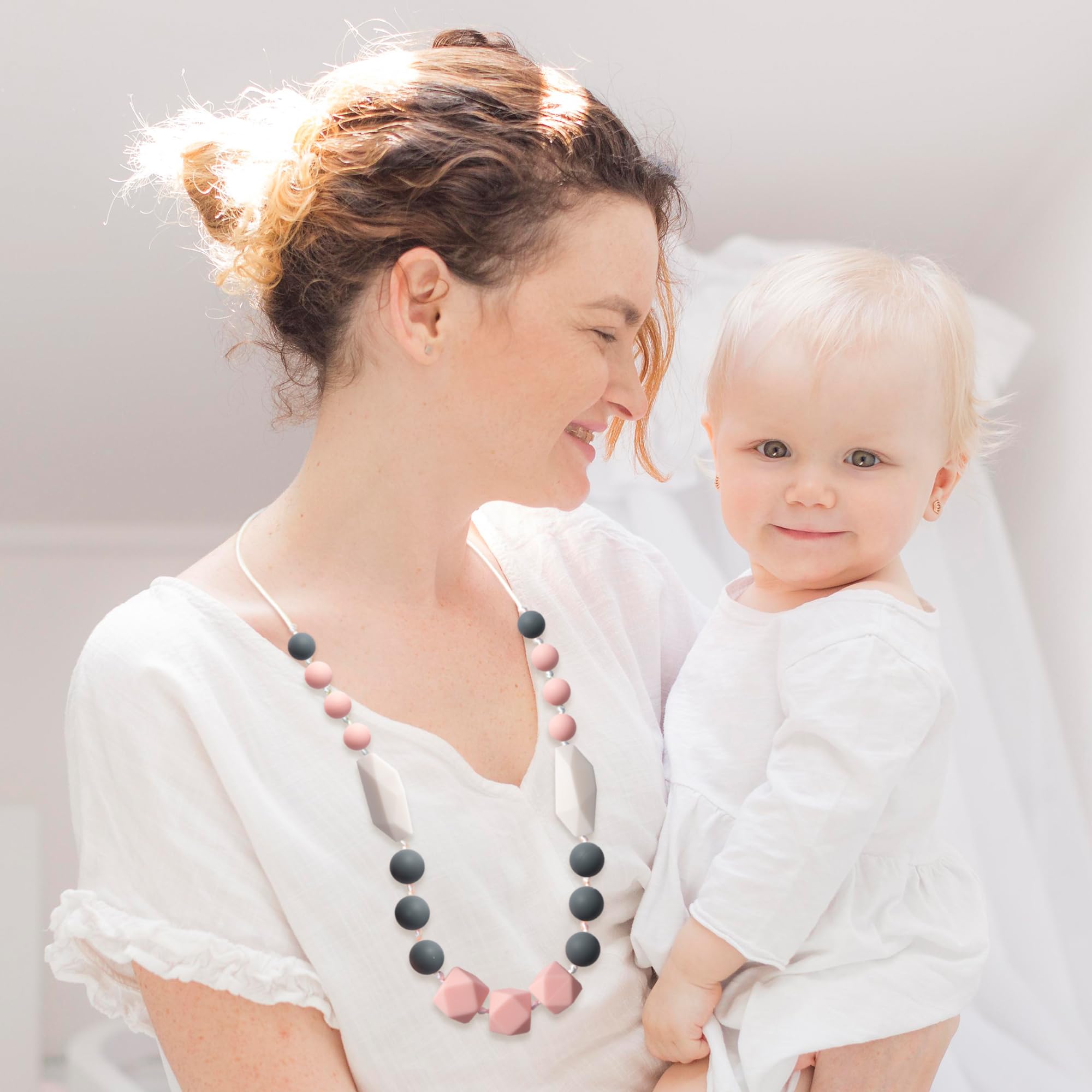 QIMGIC nursing necklace worn by mom during feeds for baby comfort.