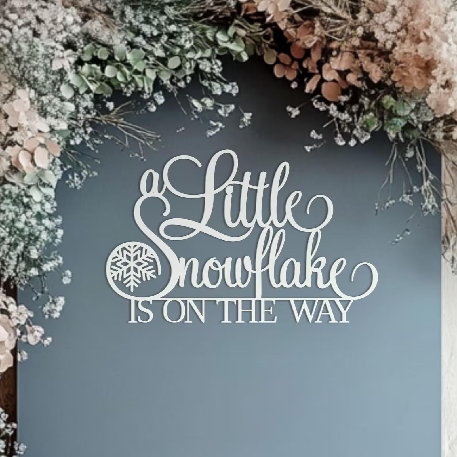 QPARTYFIRE A Little Snowflake Is On The Way sign backdrop for festive photos and winter parties.