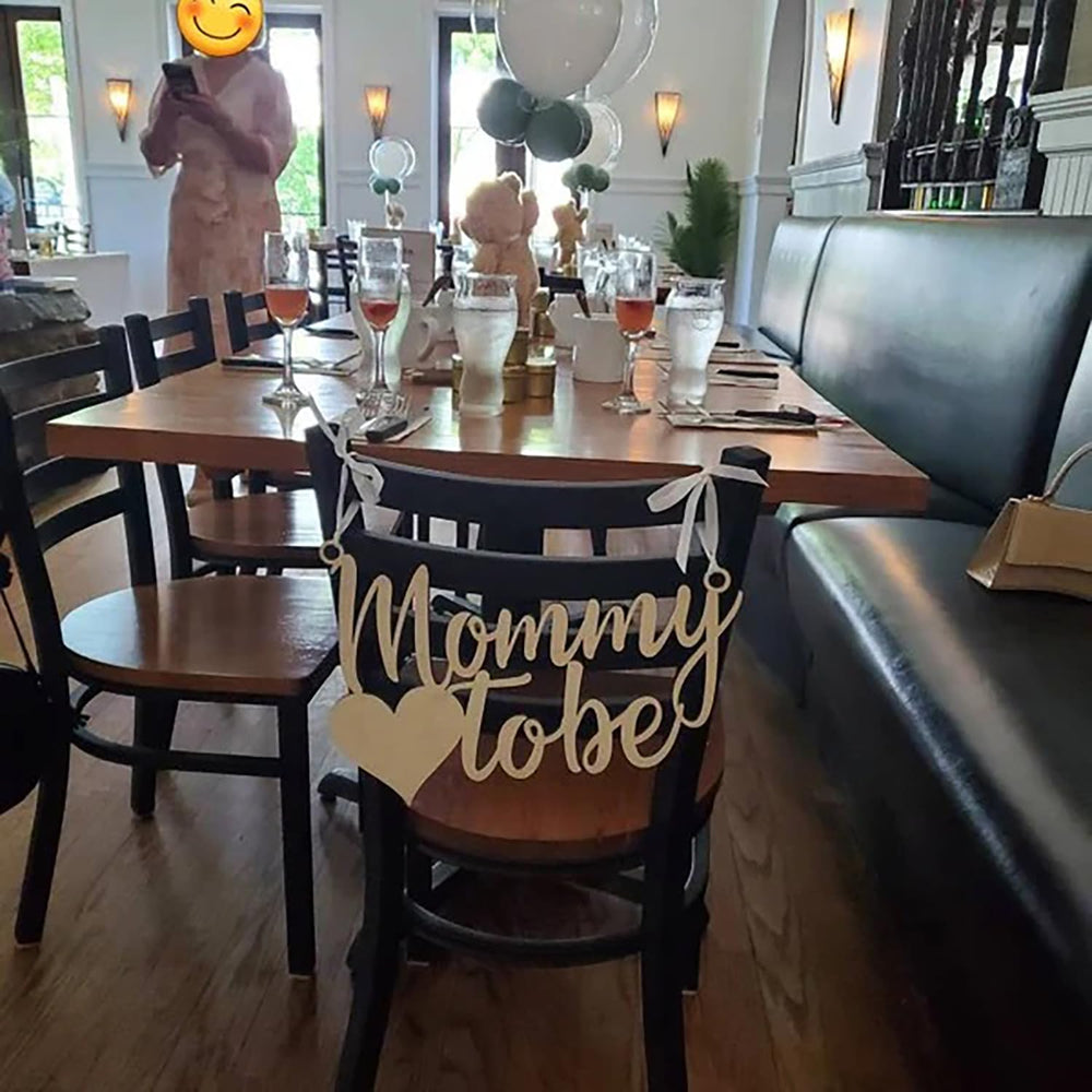 QPARTYFIRE Mommy to Be Chair Sign demonstrates durability for event use and reuse as keepsake.