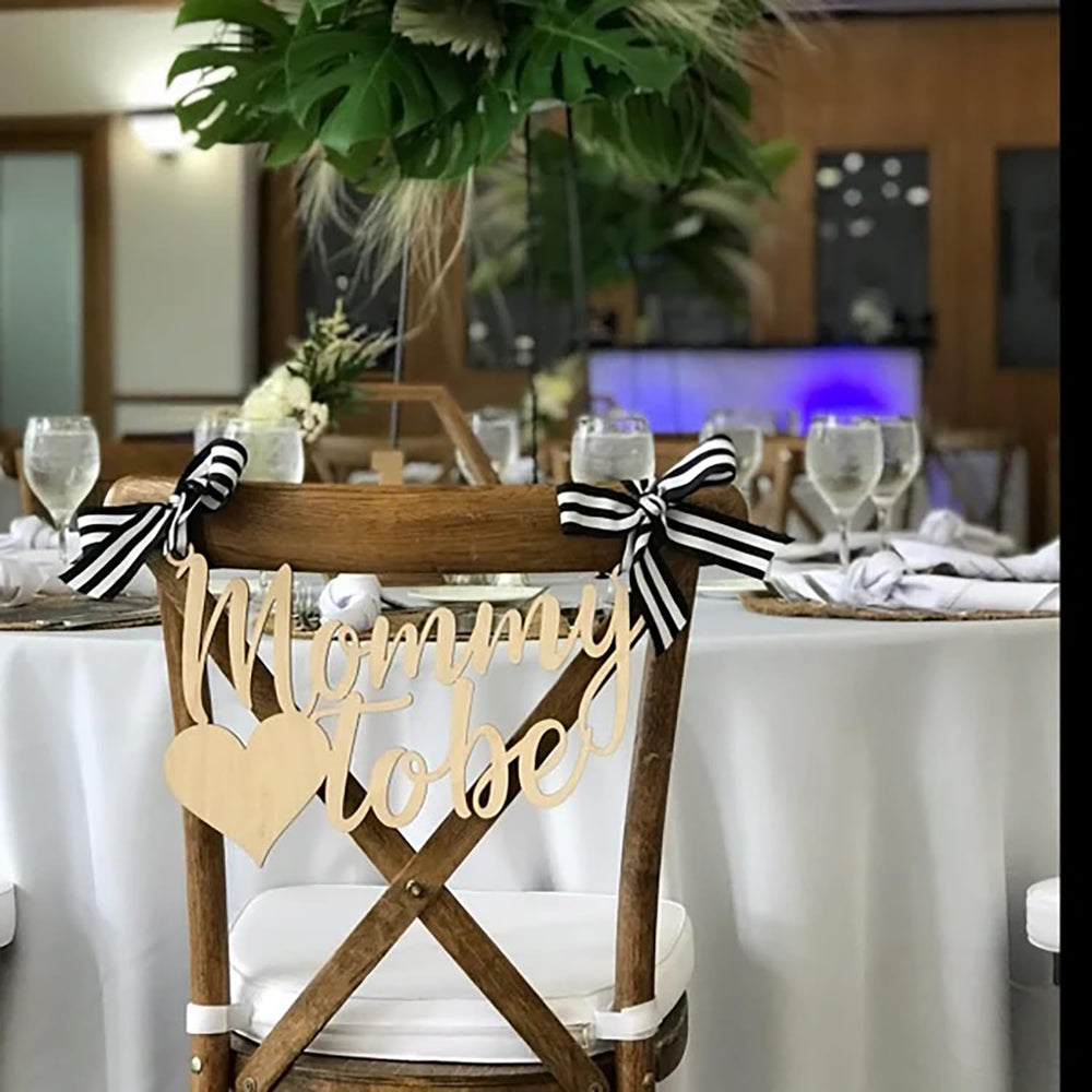 QPARTYFIRE Mommy to Be Chair Sign as a cherished keepsake for the mom-to-be.