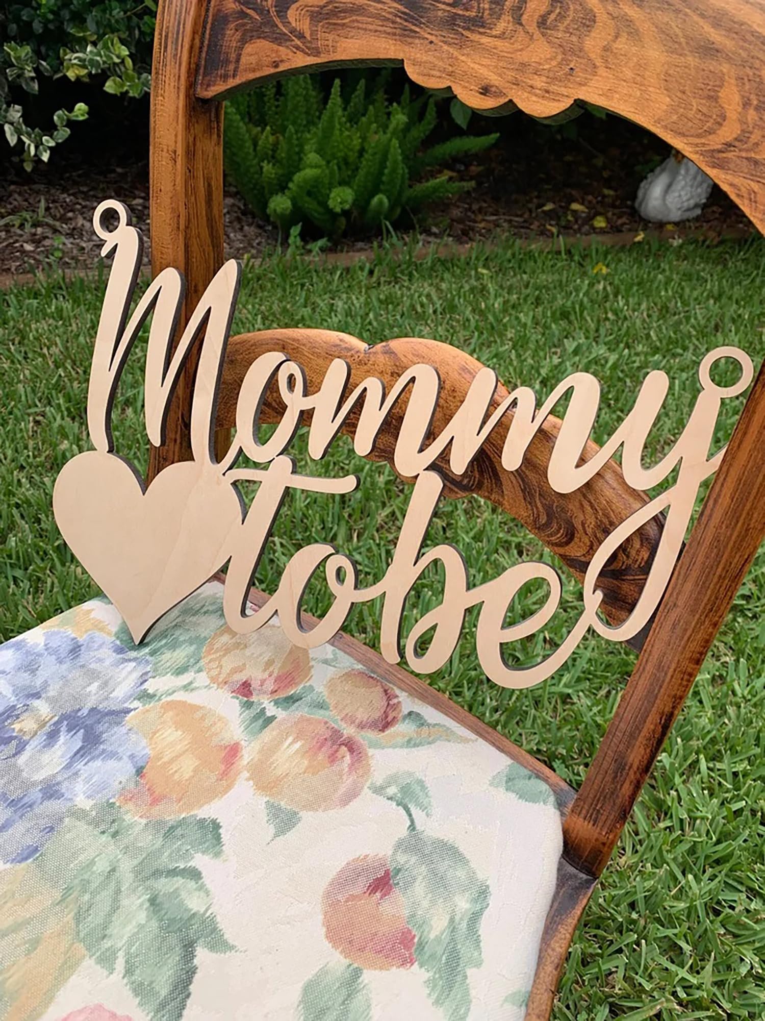 QPARTYFIRE Mommy to Be Chair Sign on chair enhances focal moment of the reveal.