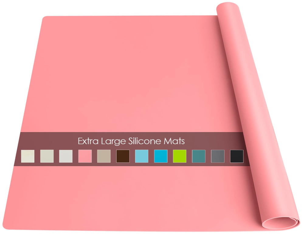 QPIX DIGITAL extra-large silicone table mat pink flat protects surfaces during dining and crafts.