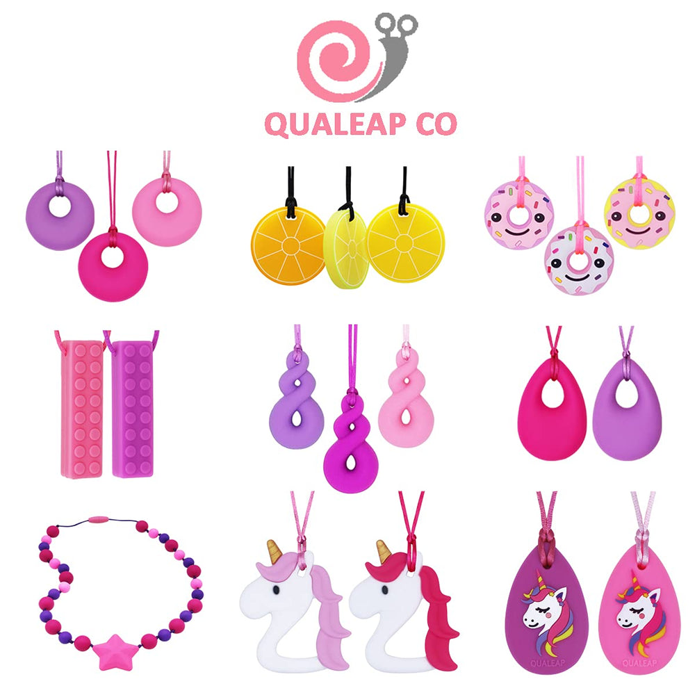 QUALEAP AMBER Kids wearing chew necklace demonstrates teething and focus benefits.
