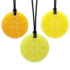 QUALEAP AMBER lemon slice necklace closeup demonstrates durable chew for sensory calm and focus.