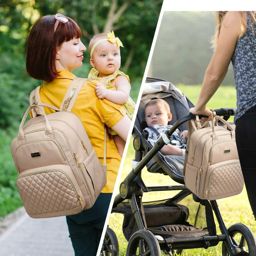 Qualyphant diaper bag backpack interior compartments organized for diapers, wipes, snacks.