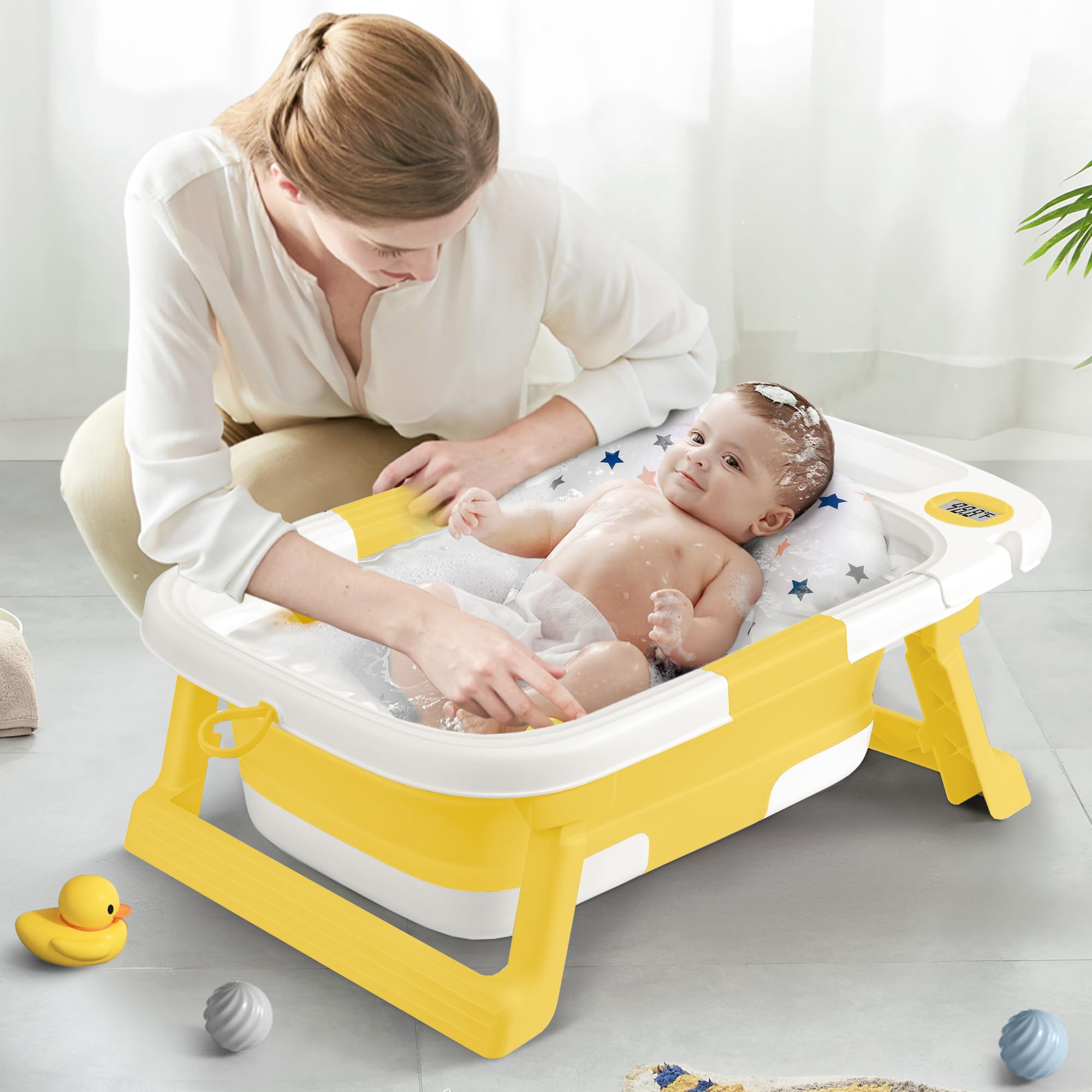 QueenFul collapsible baby bathtub travel-ready design suits newborns to toddlers.