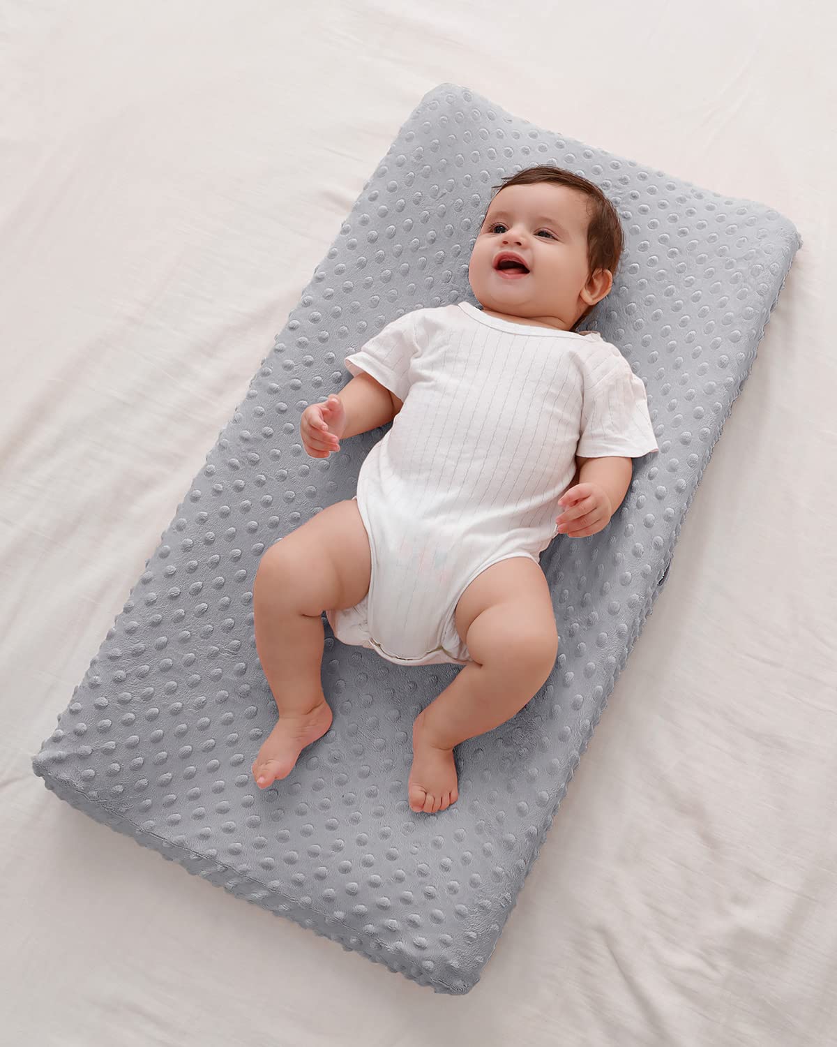 QUENESS BABY changing pad cover machine washable for easy care