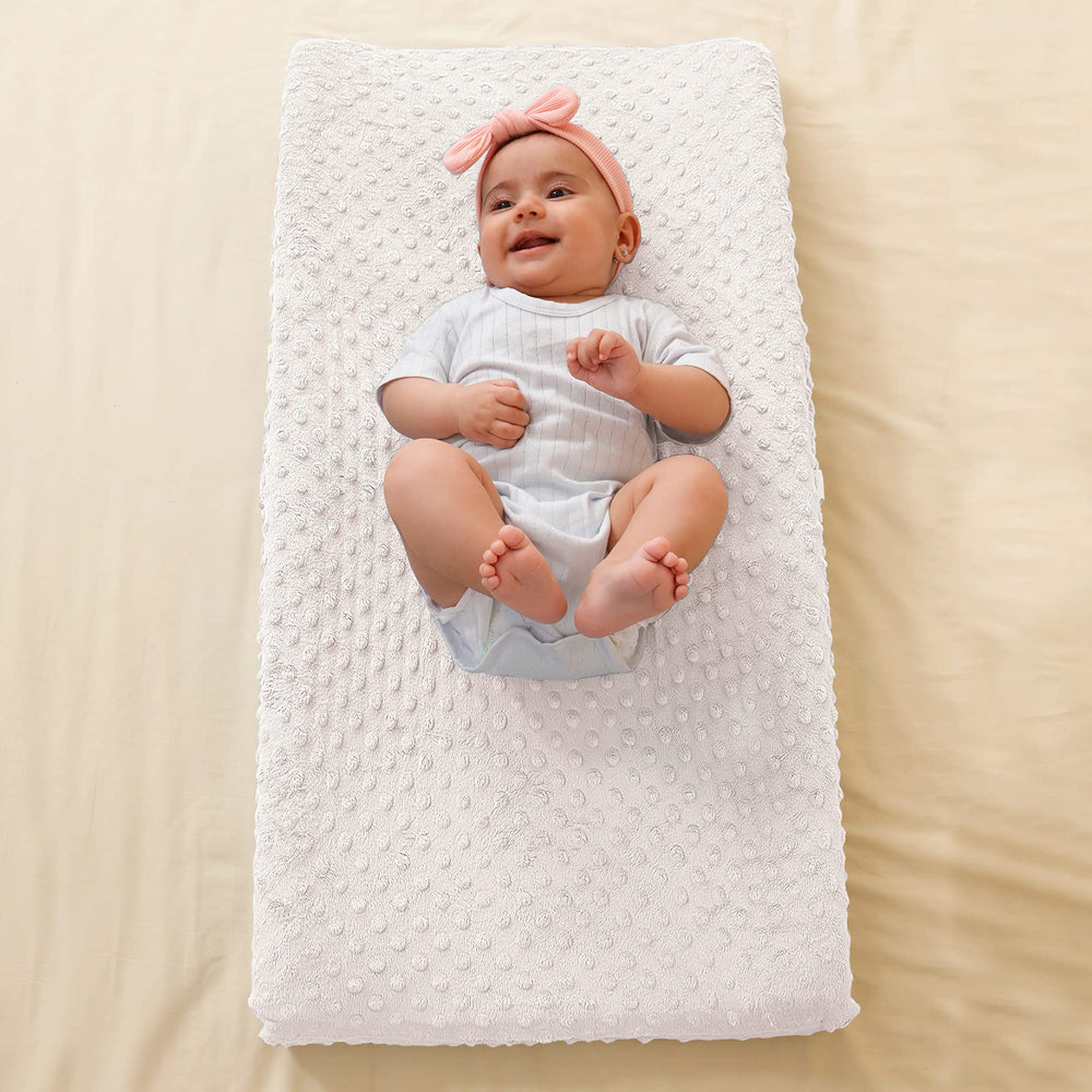 QUENESS secure-stays design keeps the cover in place on flat or contoured pads