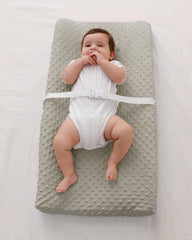 QUENESS BABY unisex modern design adds style to any nursery changing area.