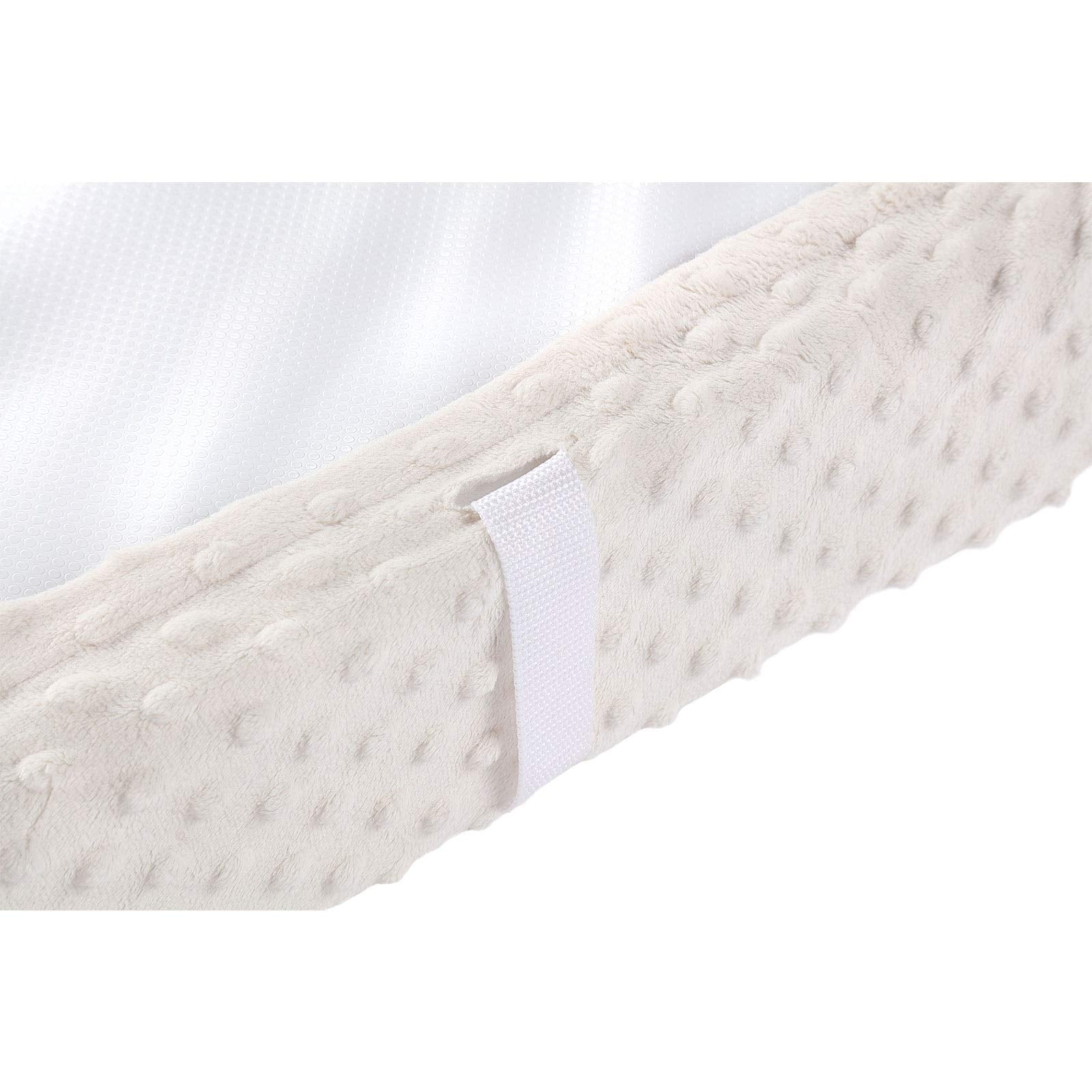 QUENESS beige waterproof back helps keep the changing pad dry after messes