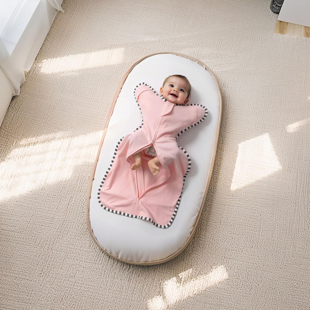 QUENESS Cotton breathable swaddle offers lightweight comfort for newborns.