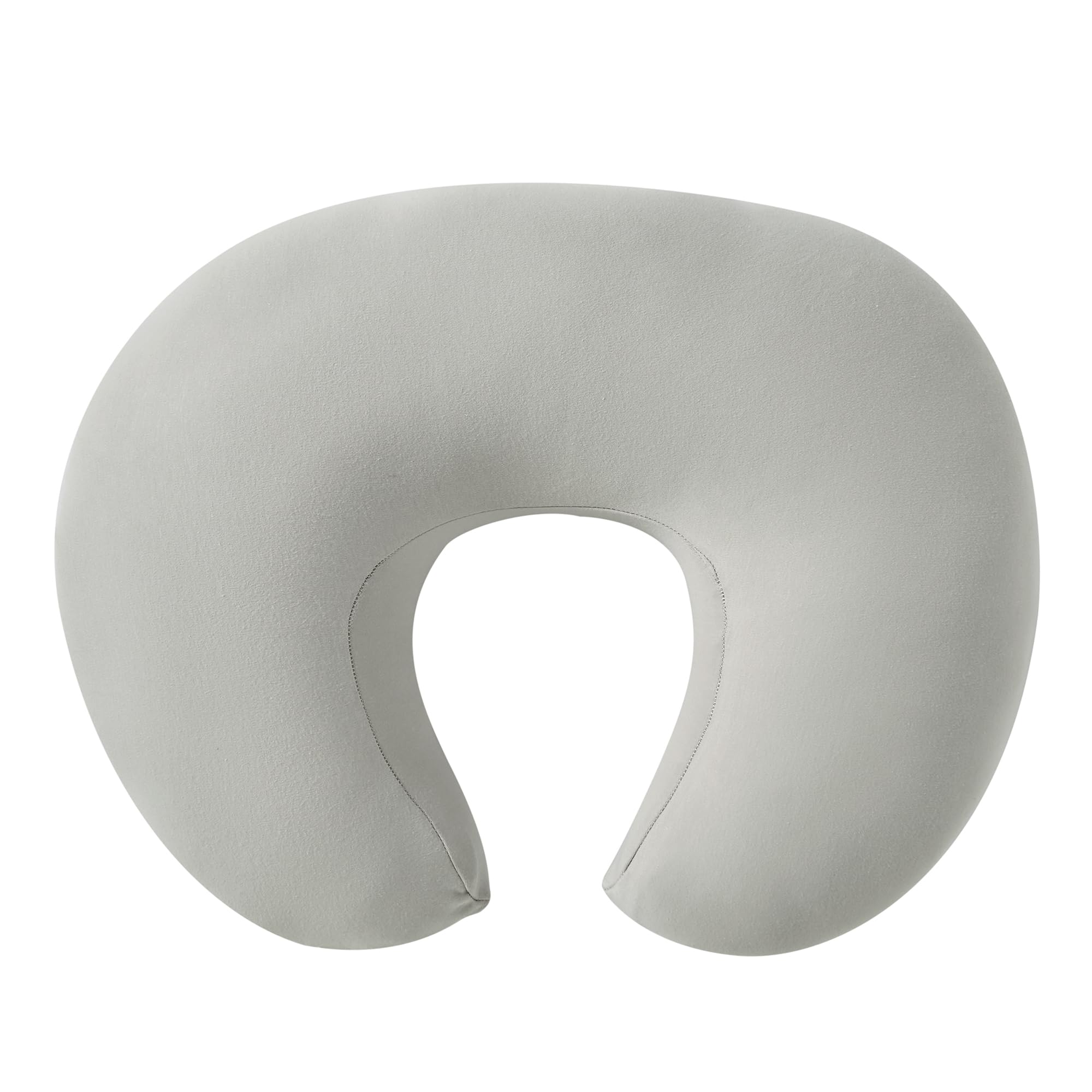 QUENESS nursing pillow dimples feature supports baby's secure seating during feeding.