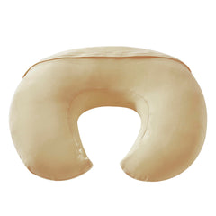 QUENESS nursing pillow with baby seated on dimples for safety and comfort.