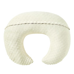 QUENESS pillow demonstrates baby sitting position with secure support