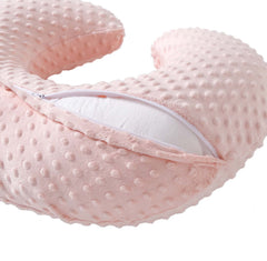 QUENESS nursing pillow in feeding position provides ergonomic support.