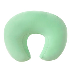 QUENESS nursing pillow green dimples detail highlights baby's safe seating and comfort.