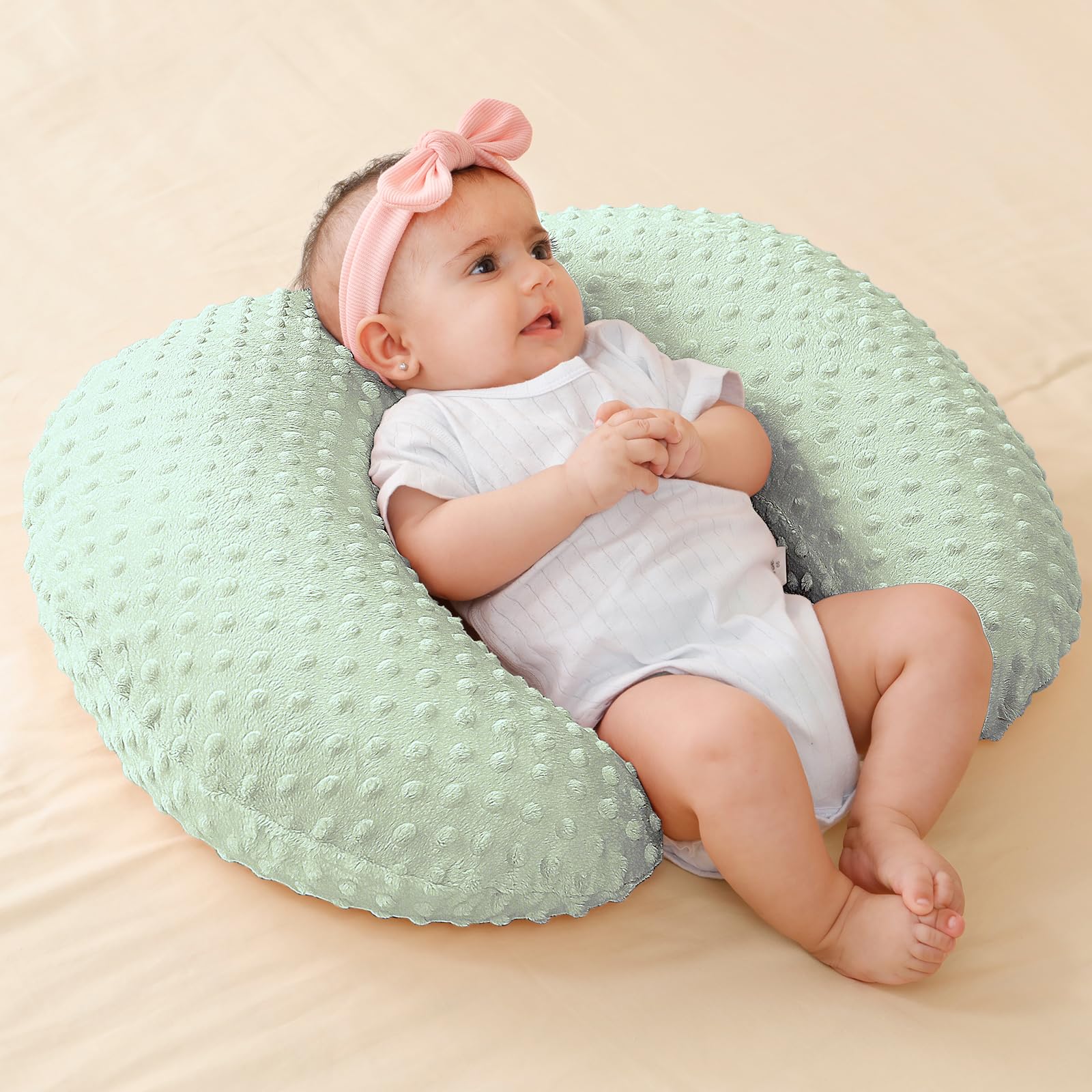 QUENESS nursing pillow green washable-cover shows machine-wash convenience.