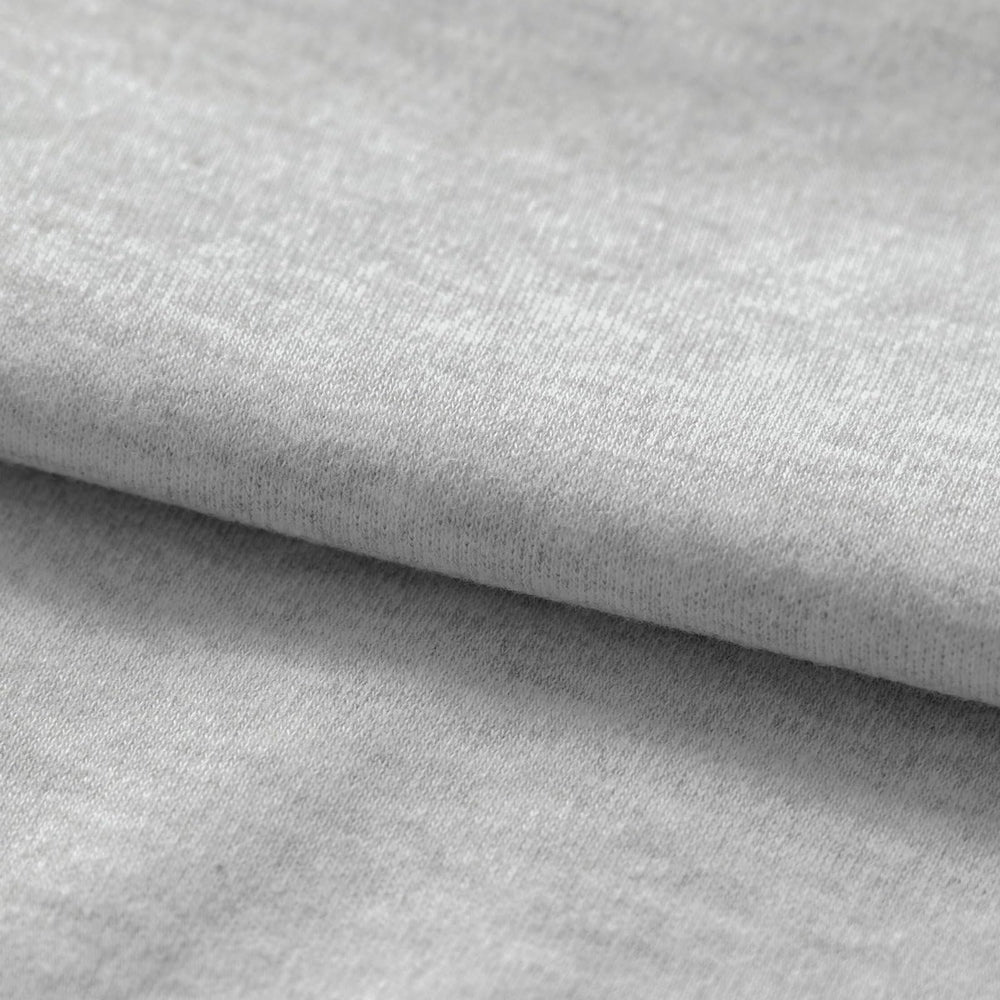 Queness velcro-fastening swaddle enables snug, adjustable wrapping.