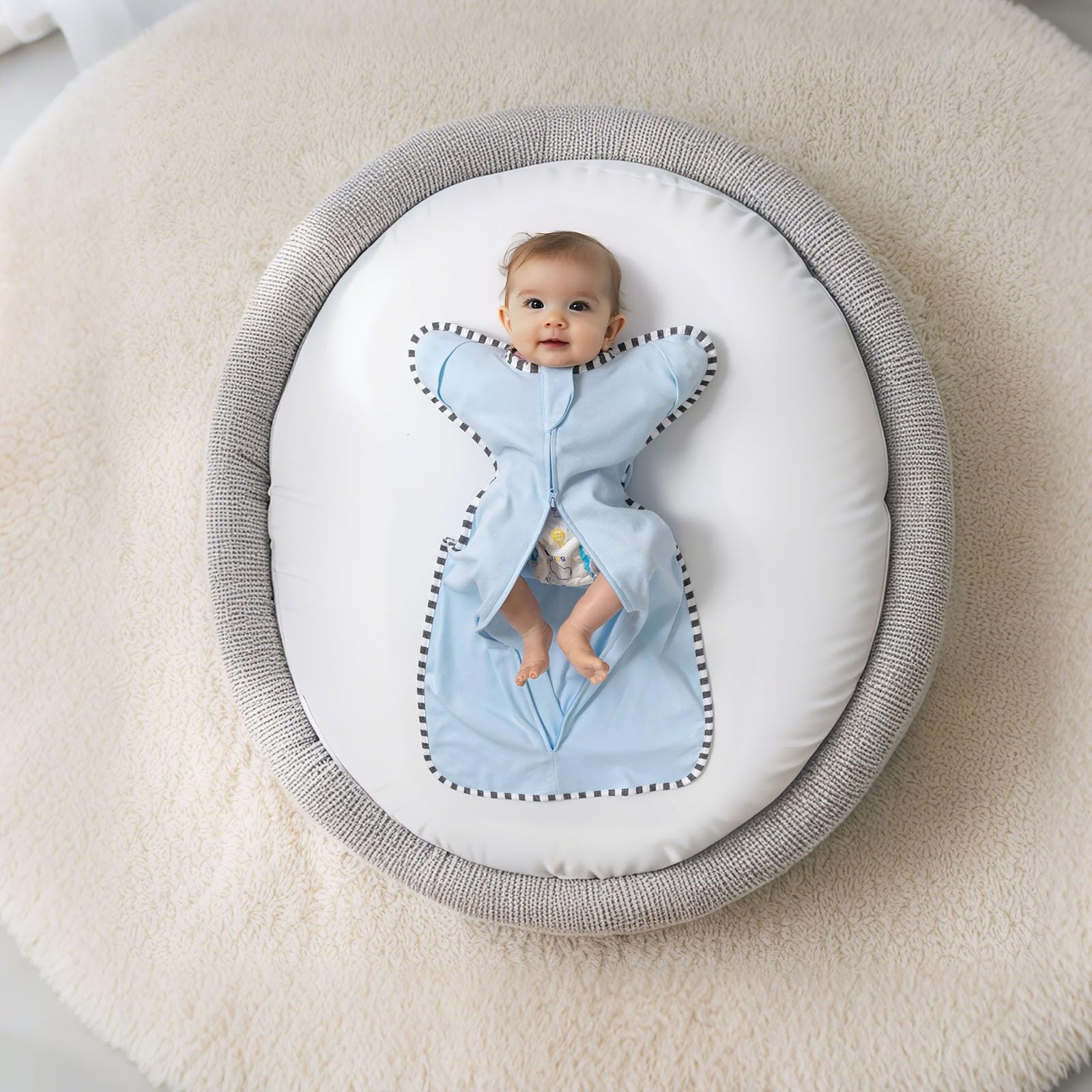 Queness Transition Swaddle cotton fabric—lightweight feel for all-night comfort.