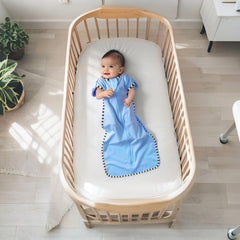 QUENESS transition swaddle khaki and sky blue pack in nursery setting
