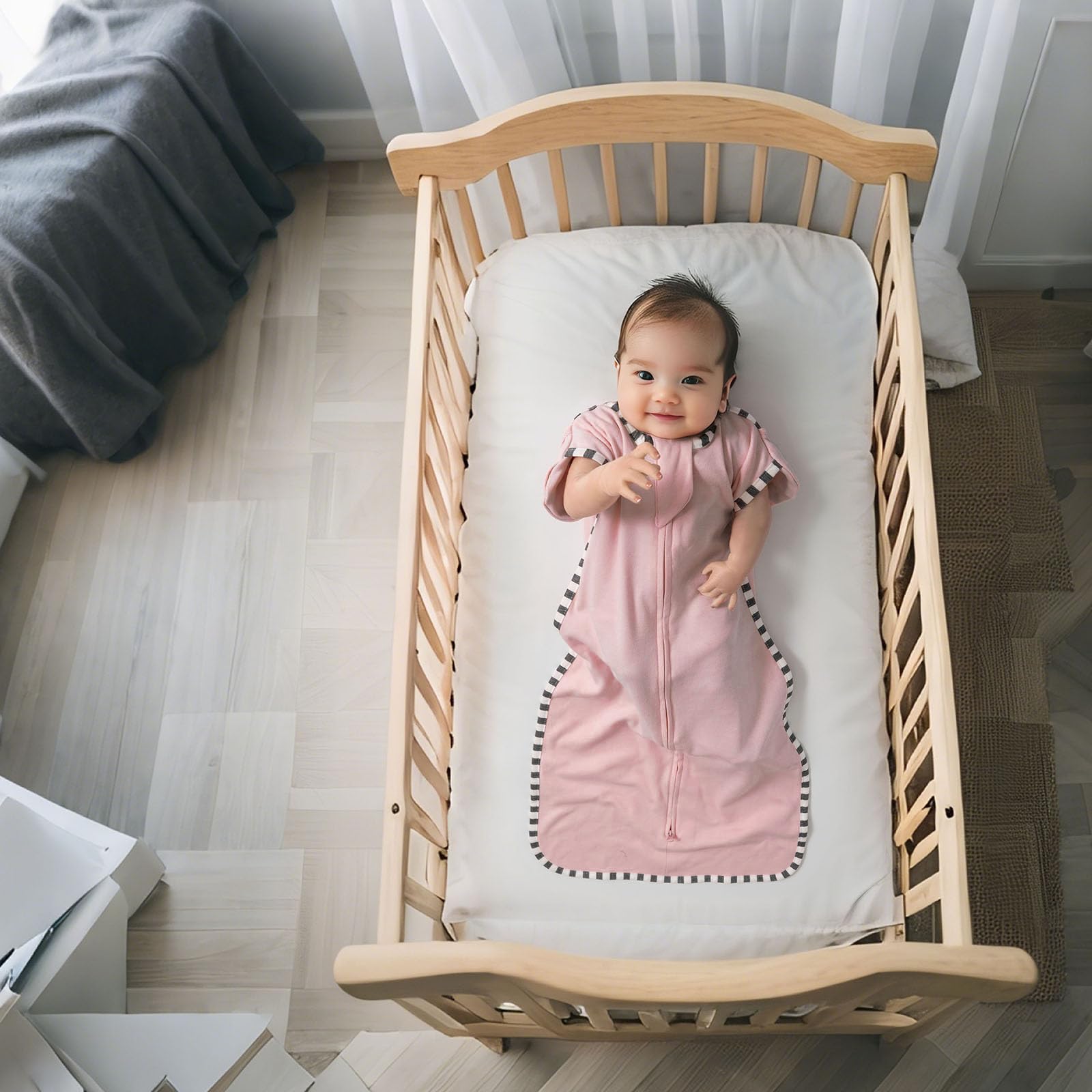 QUENESS Transition Swaddle 2-way zipper detail for easy diaper changes.