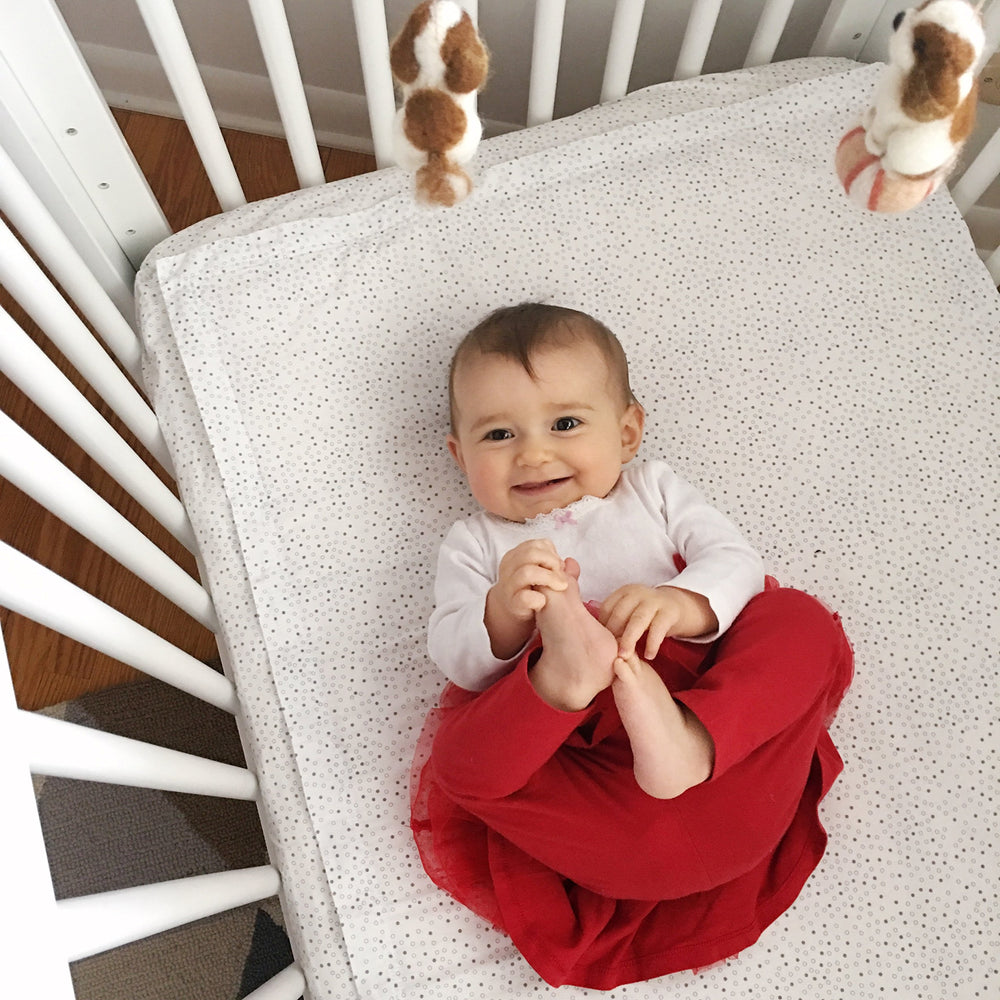 QuickZip ivory zip-on sheets demonstrate easy, fast changes for busy parents